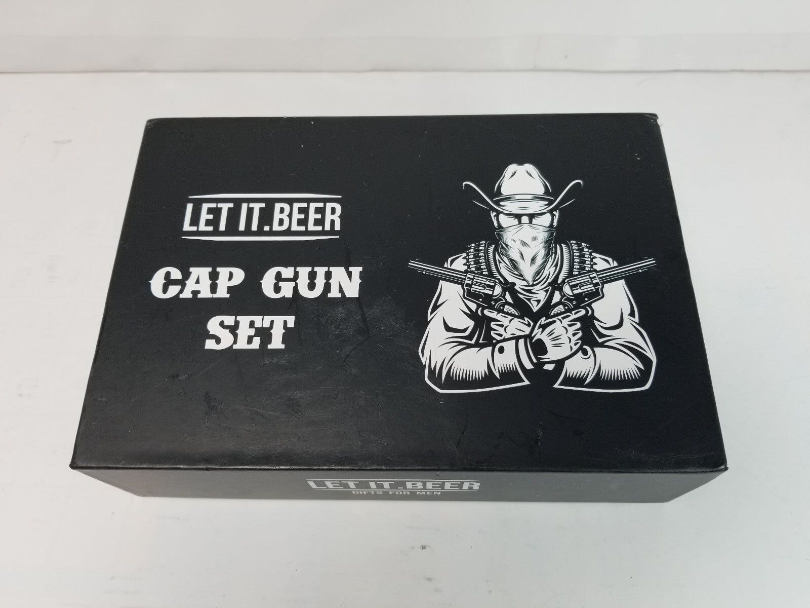 LET IT BEER CAP GUN SET